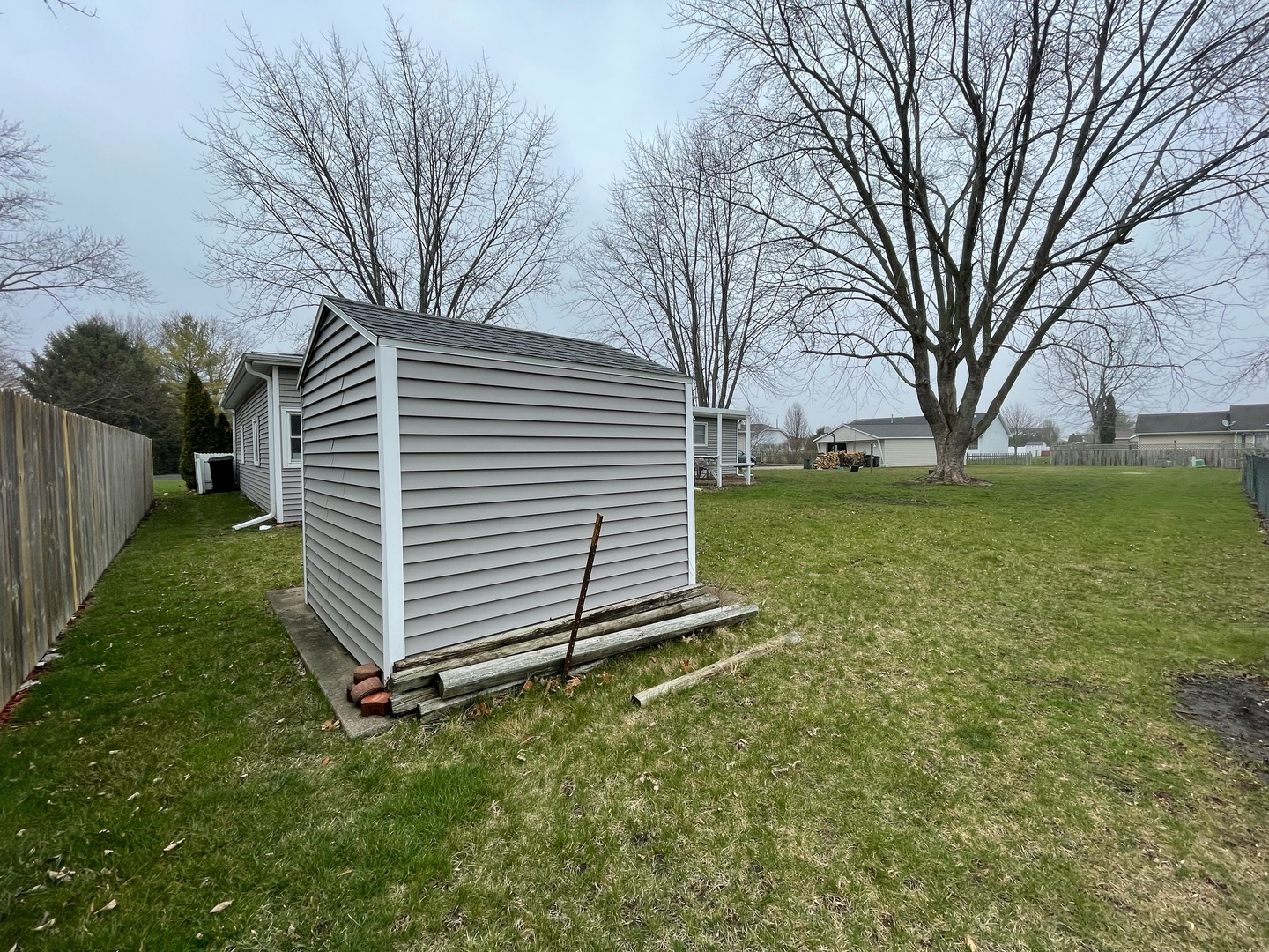 405 Park Circle St. Joseph, IL 61873 - Photo 35 of 35 a view of a backyard with a large tree