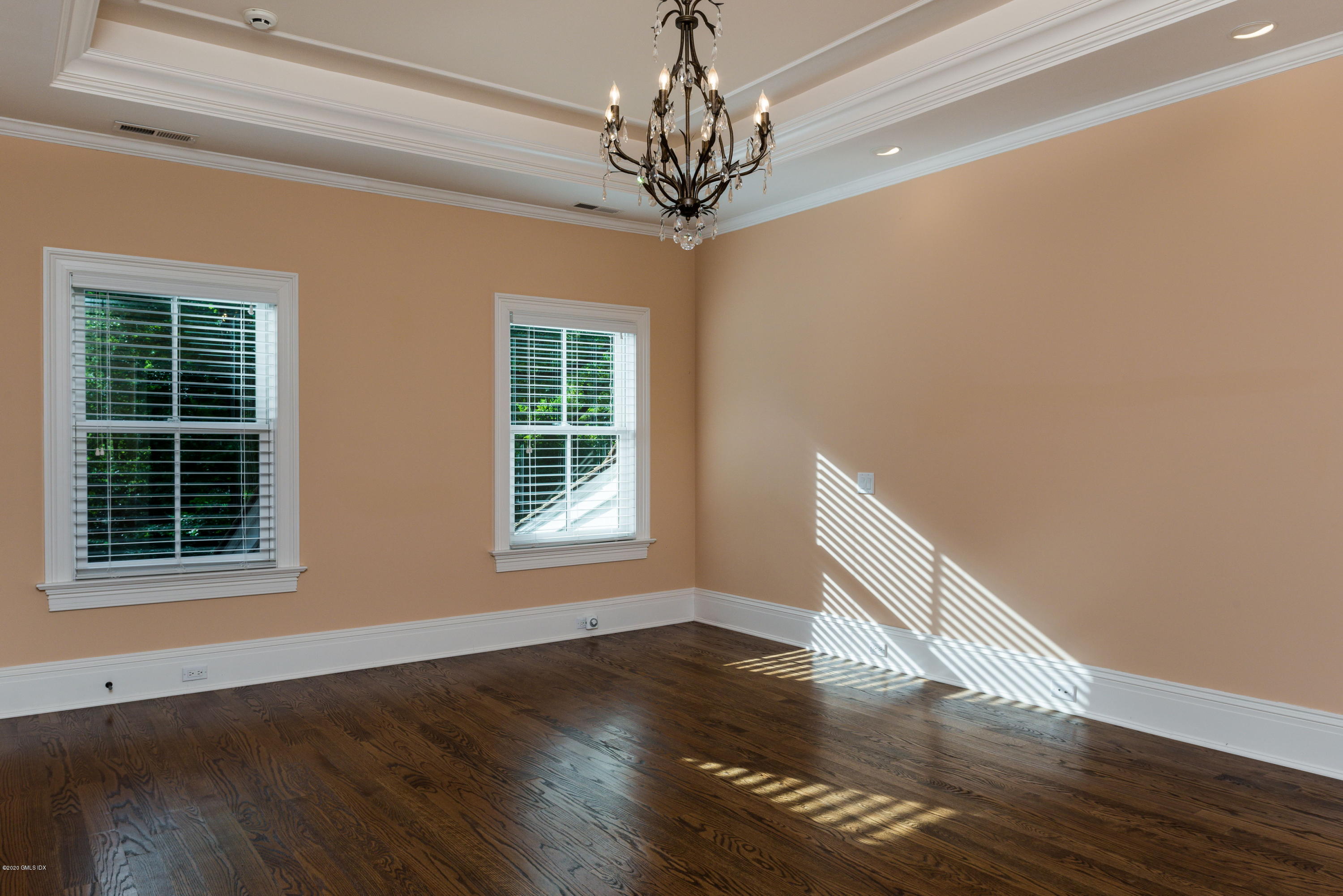 53 Hillside Road Greenwich, CT 06830 - Photo 20 of 31 a view of an empty room with wooden floor and a window