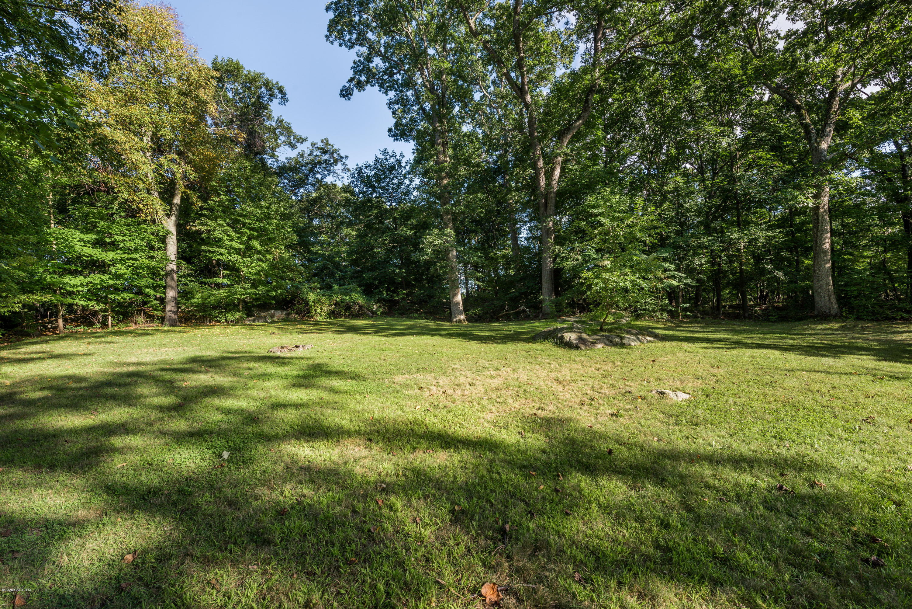 53 Hillside Road Greenwich, CT 06830 - Photo 31 of 31 a view of outdoor space with deck and yard