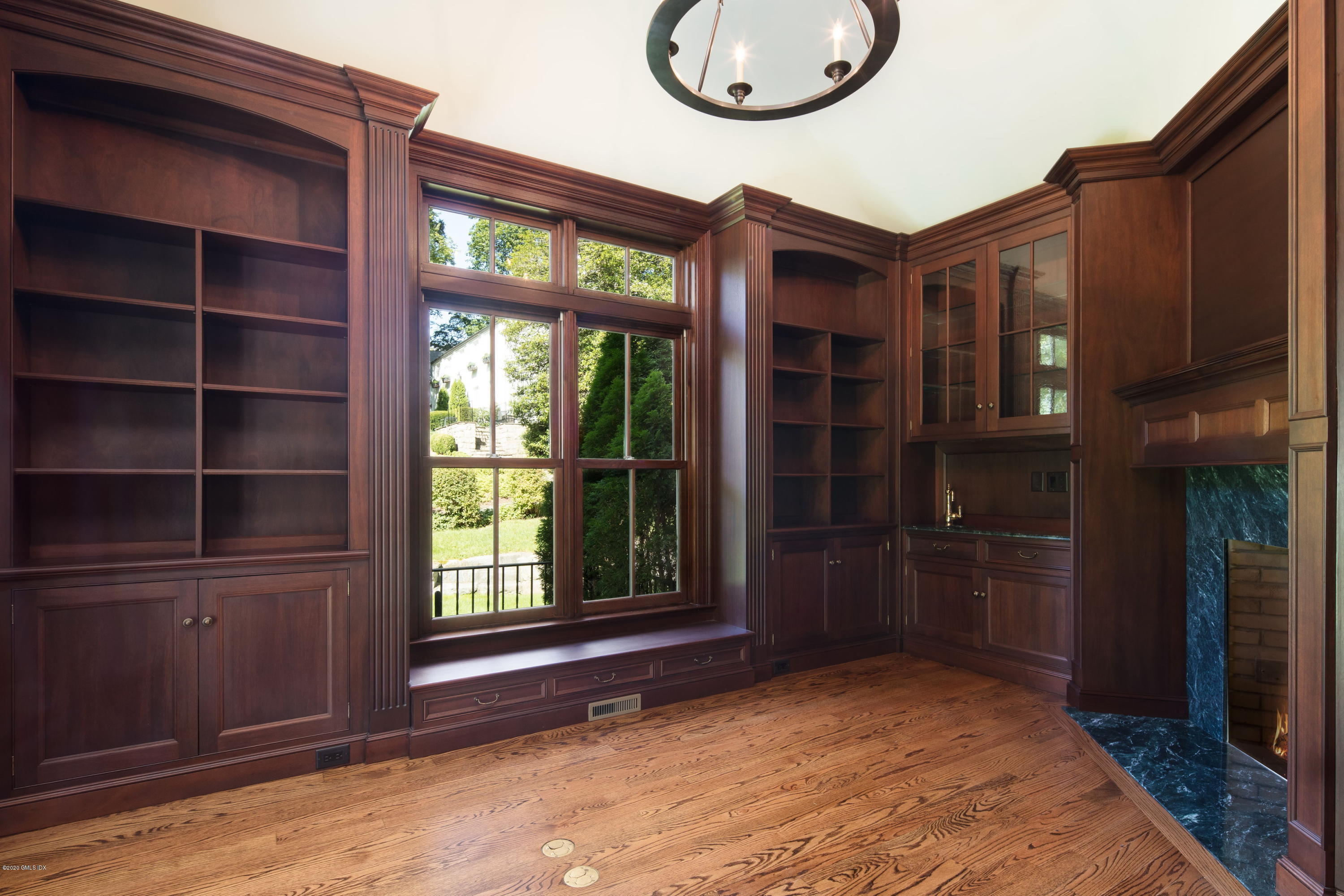 53 Hillside Road Greenwich, CT 06830 - Photo 7 of 31 a view of an entryway with a fireplace