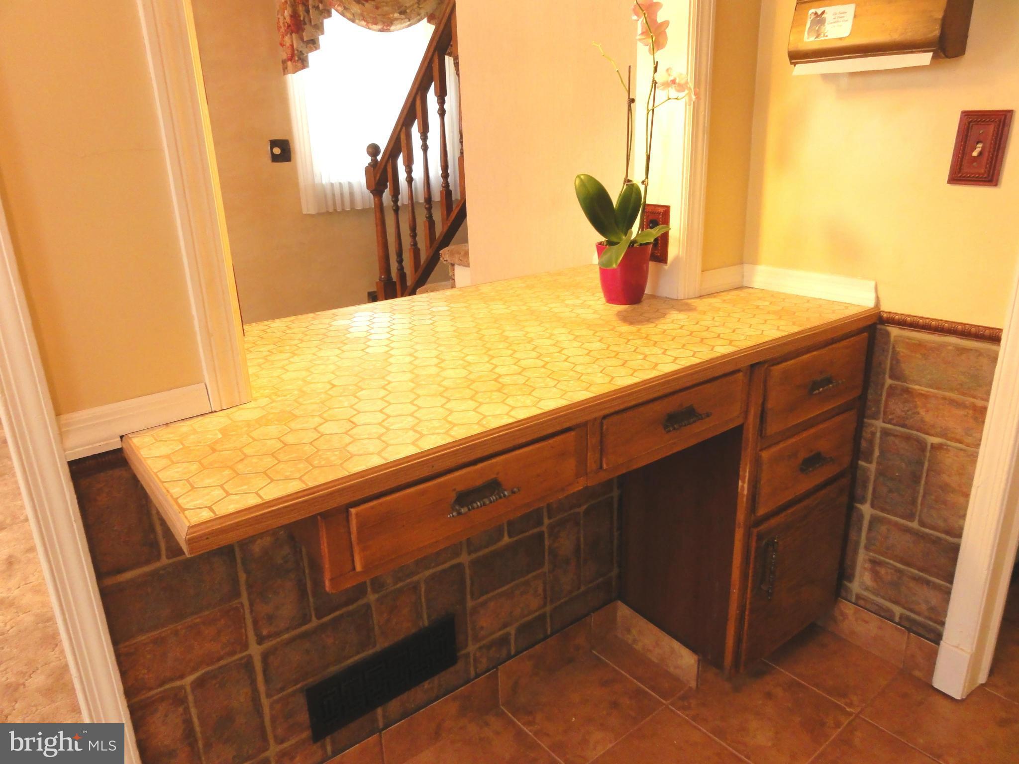 1501 Clairidge Road Baltimore, MD 21207 - Photo 12 of 28 Ceramic tile breakfast bar.