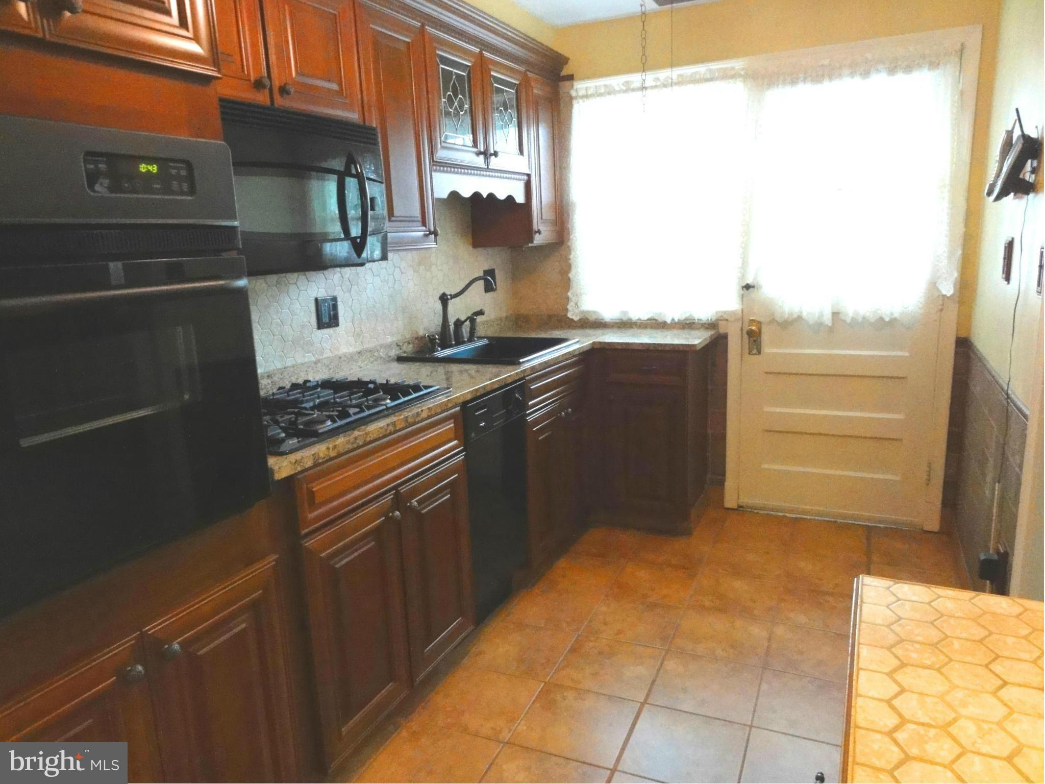 1501 Clairidge Road Baltimore, MD 21207 - Photo 4 of 28 Heated Ceramic Tile Floor