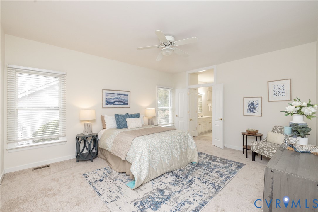 5713 Promontory Place Midlothian, VA 23112 - Photo 18 of 39 a bed room with a bed and a window