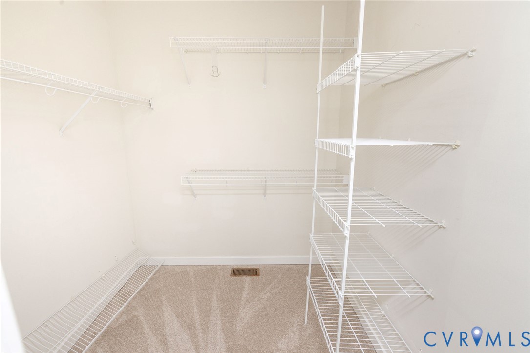 5713 Promontory Place Midlothian, VA 23112 - Photo 23 of 39 a view of an empty walk in closet