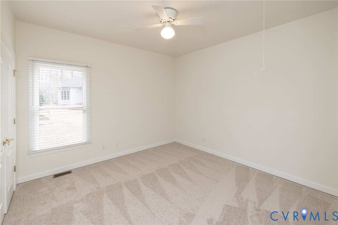 5713 Promontory Place Midlothian, VA 23112 - Photo 26 of 39 an empty room with a window