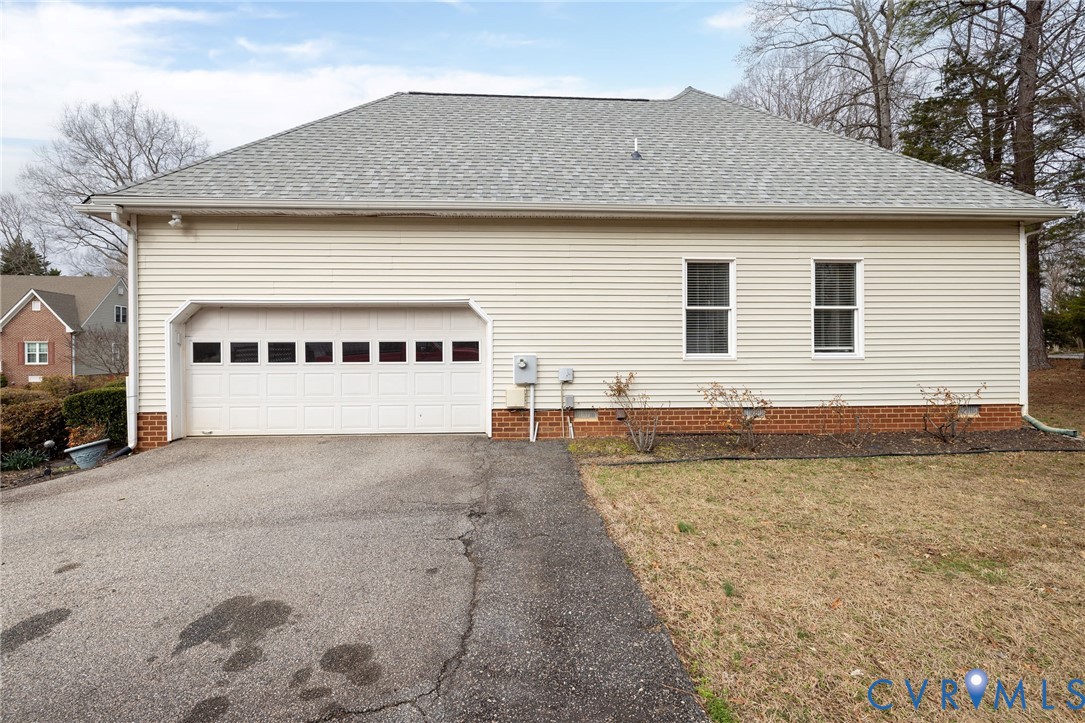 5713 Promontory Place Midlothian, VA 23112 - Photo 3 of 39 a house view with a garden space