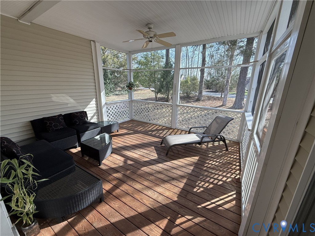 5713 Promontory Place Midlothian, VA 23112 - Photo 32 of 39 a view of balcony with couch and wooden floor