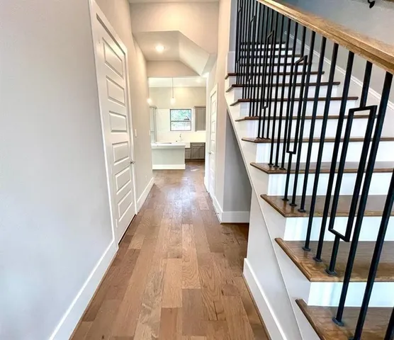 a view of entryway with wooden floor