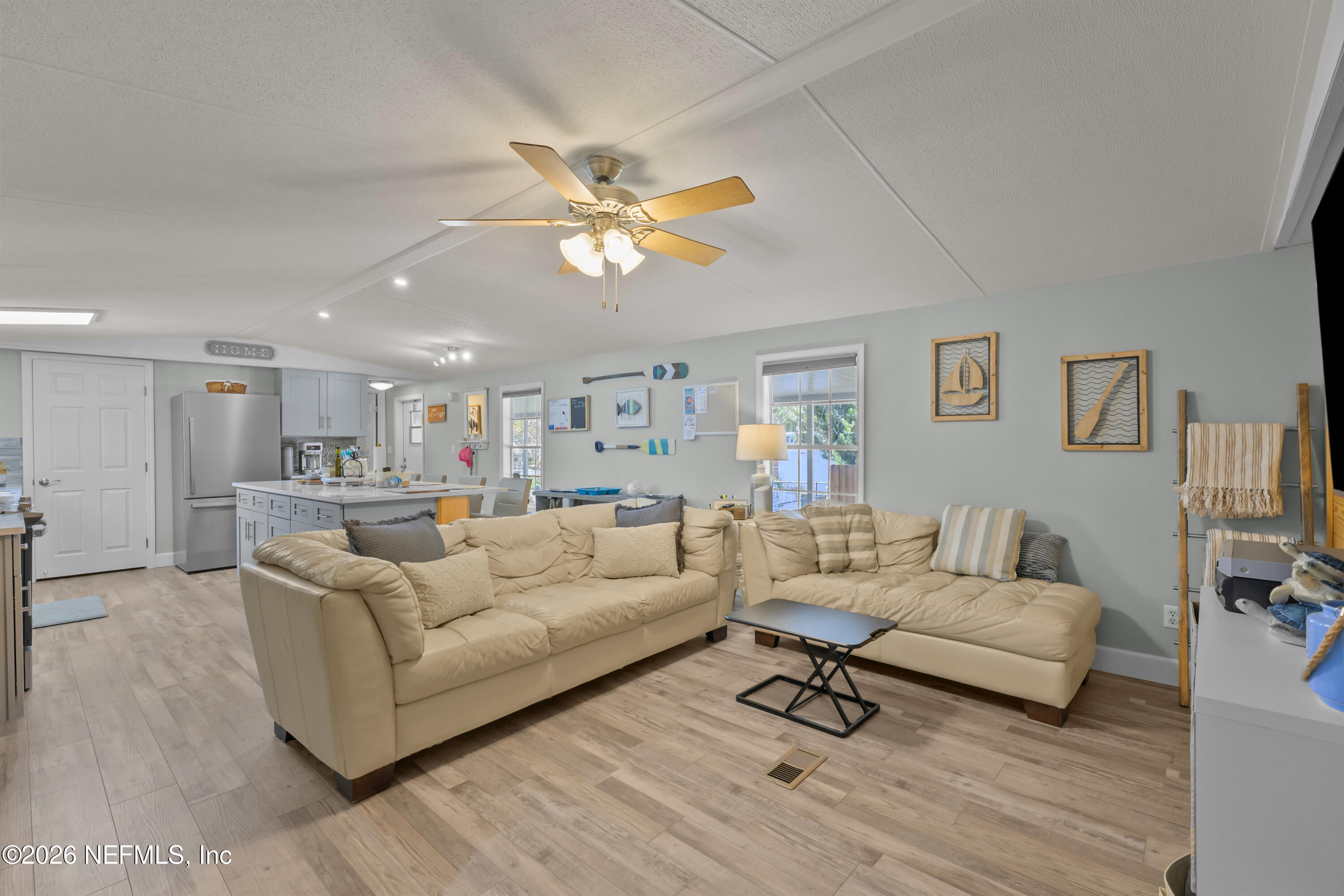 253 Hess Road Crescent City, FL 32112 - Photo 13 of 38 a living room with furniture and a large window