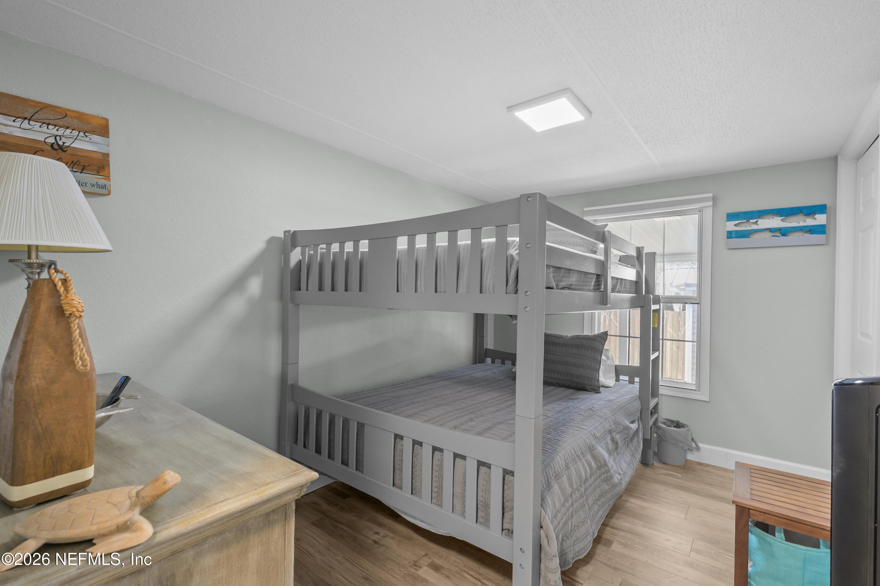 253 Hess Road Crescent City, FL 32112 - Photo 19 of 38 a view of entryway livingroom and hall with wooden floor