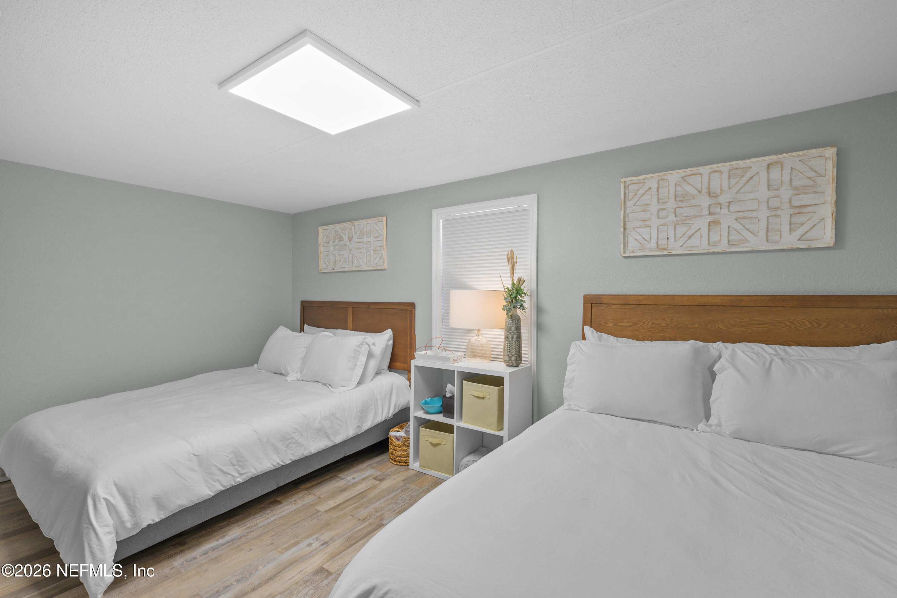 253 Hess Road Crescent City, FL 32112 - Photo 20 of 38 a bedroom with a bed and a night stand