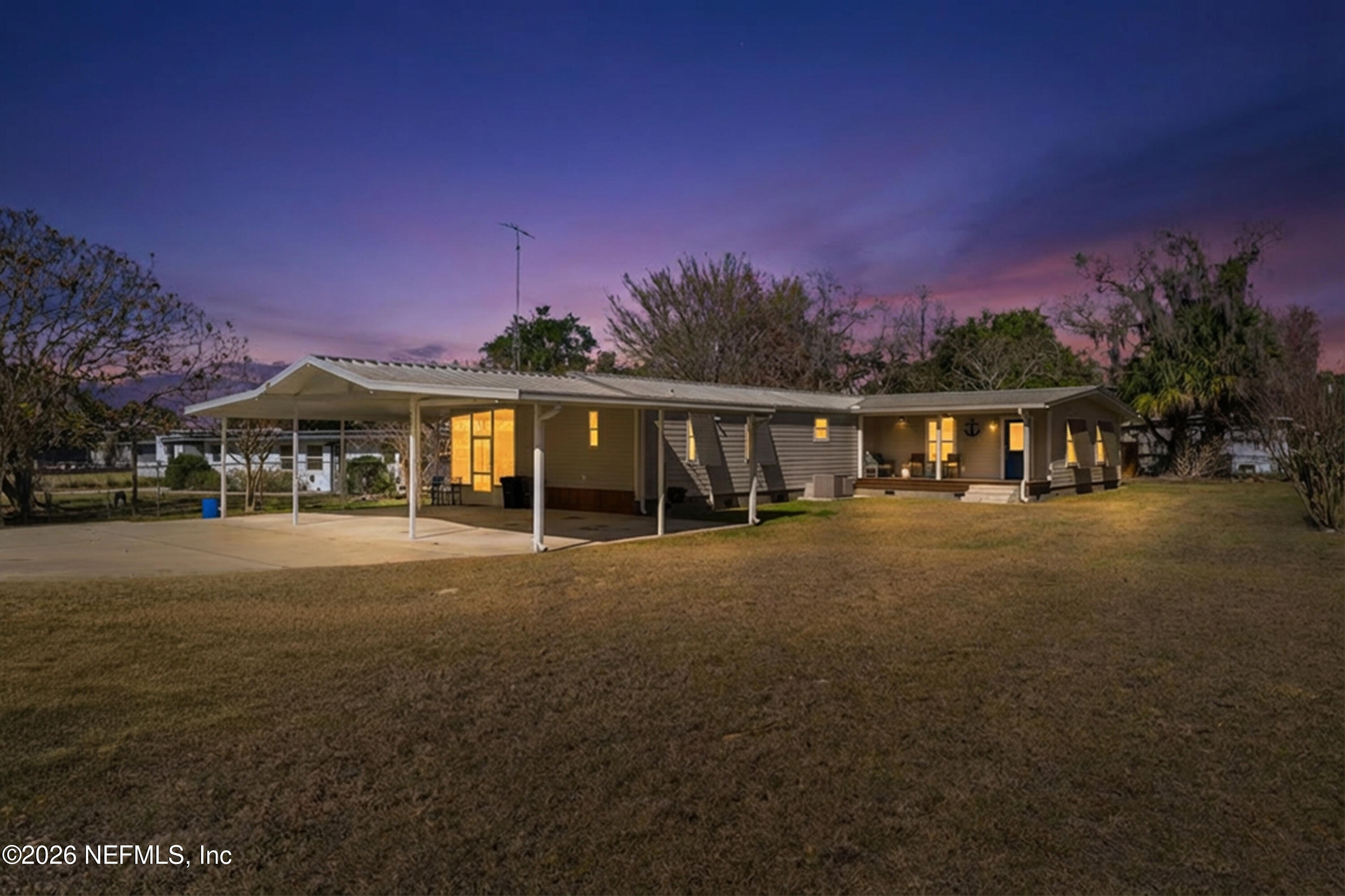 253 Hess Road Crescent City, FL 32112 - Photo 2 of 38 a view of a house with a yard