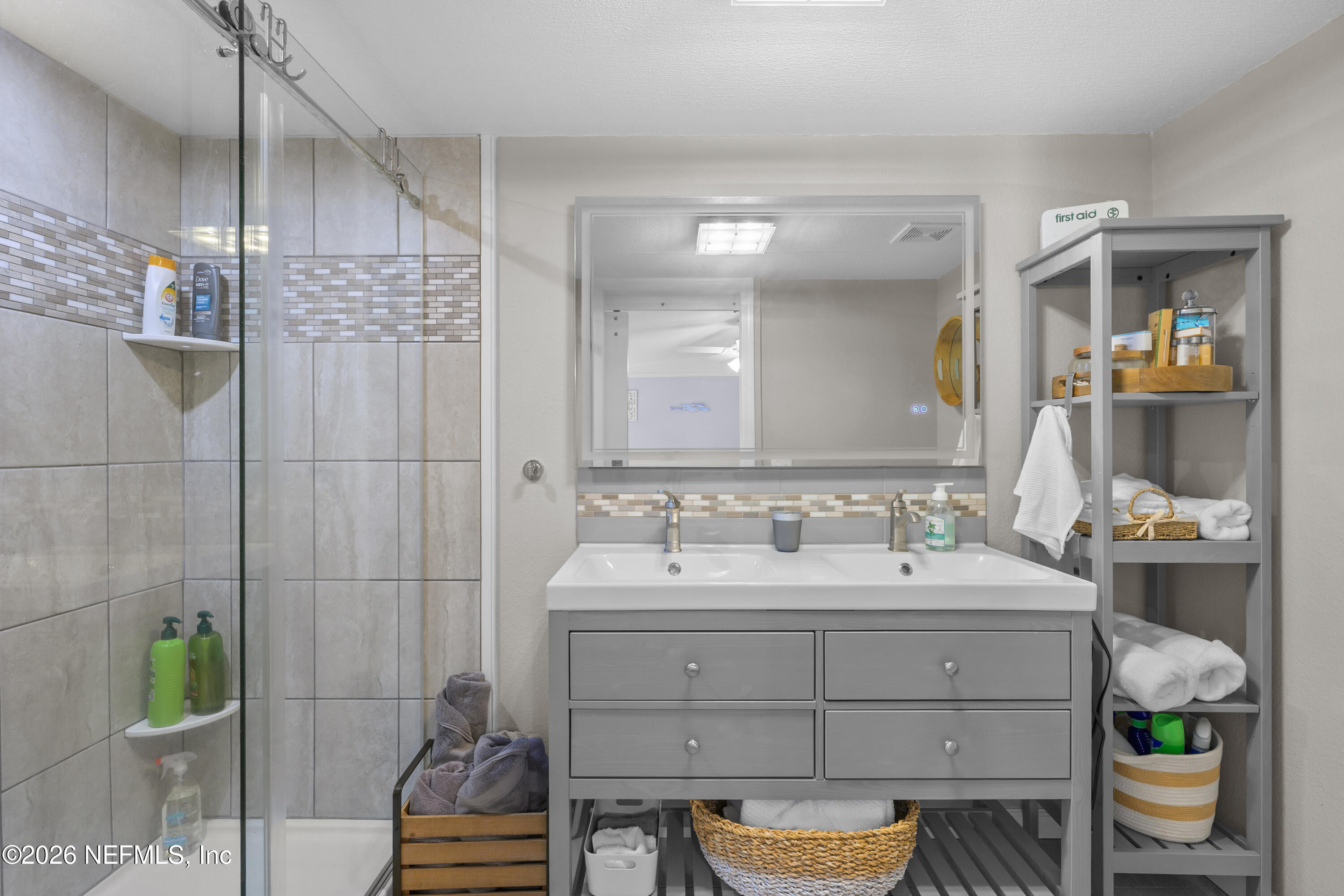 253 Hess Road Crescent City, FL 32112 - Photo 27 of 38 a bathroom with a sink a toilet and shower