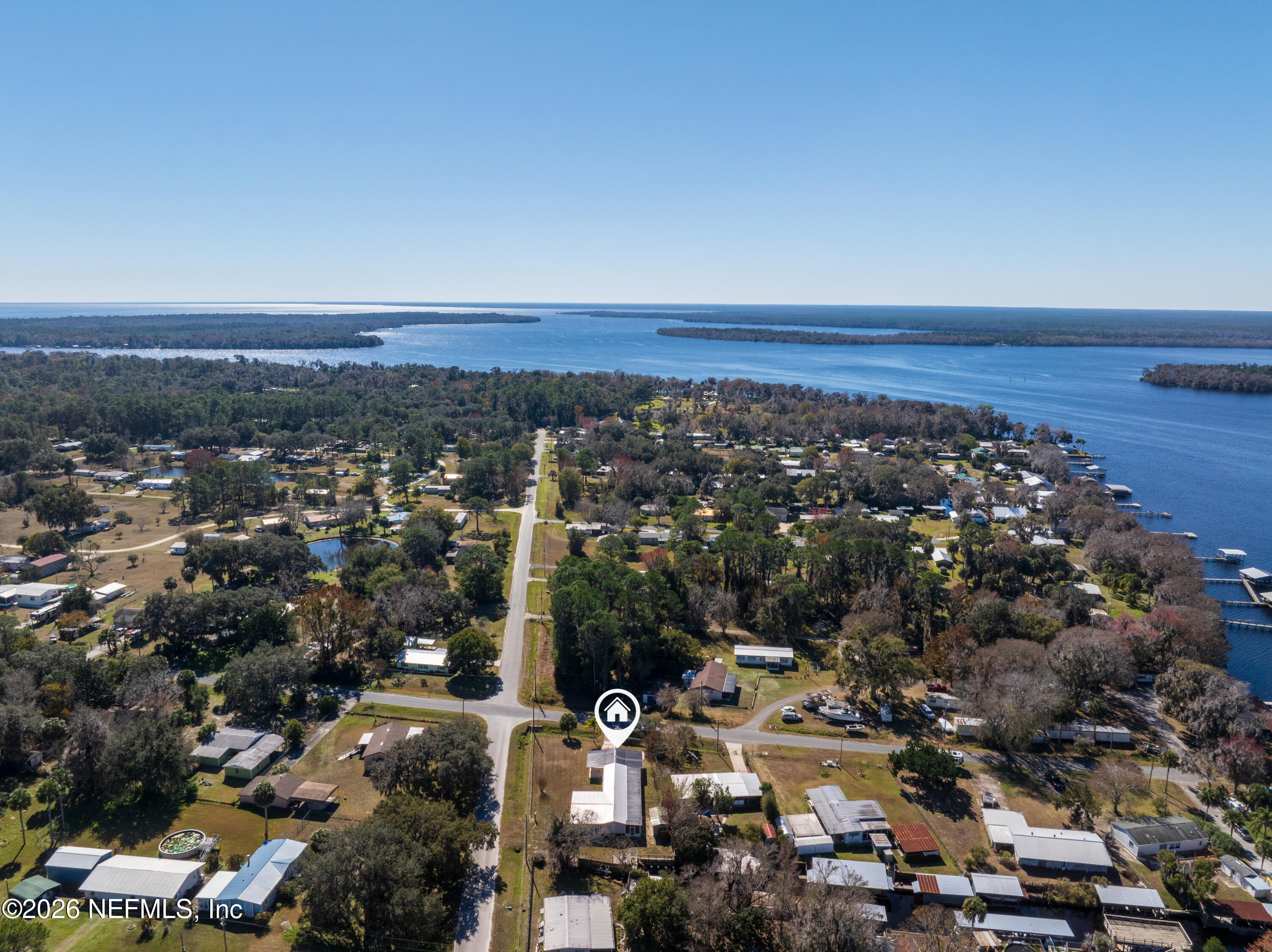 253 Hess Road Crescent City, FL 32112 - Photo 36 of 38 an aerial view of a city with lots of residential buildings