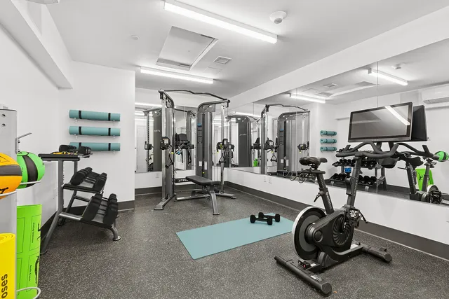 a view of a room with gym equipment