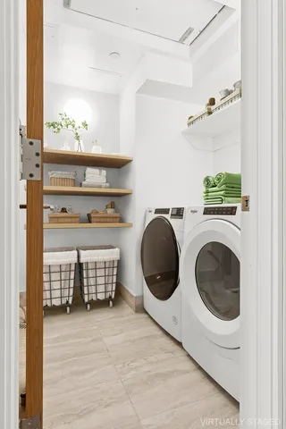 a utility room with dryer and washer