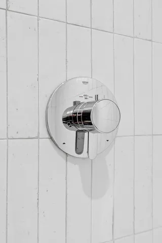 a bathroom with a sink and cabinets