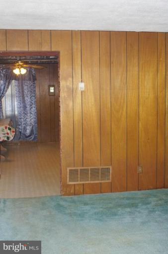 2907 Rayshire Road Baltimore, MD 21230 - Photo 3 of 7 a view of a room with wooden walls