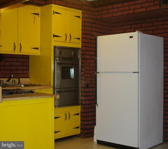 2907 Rayshire Road Baltimore, MD 21230 - Photo 4 of 7 a utility room with dryer and washer