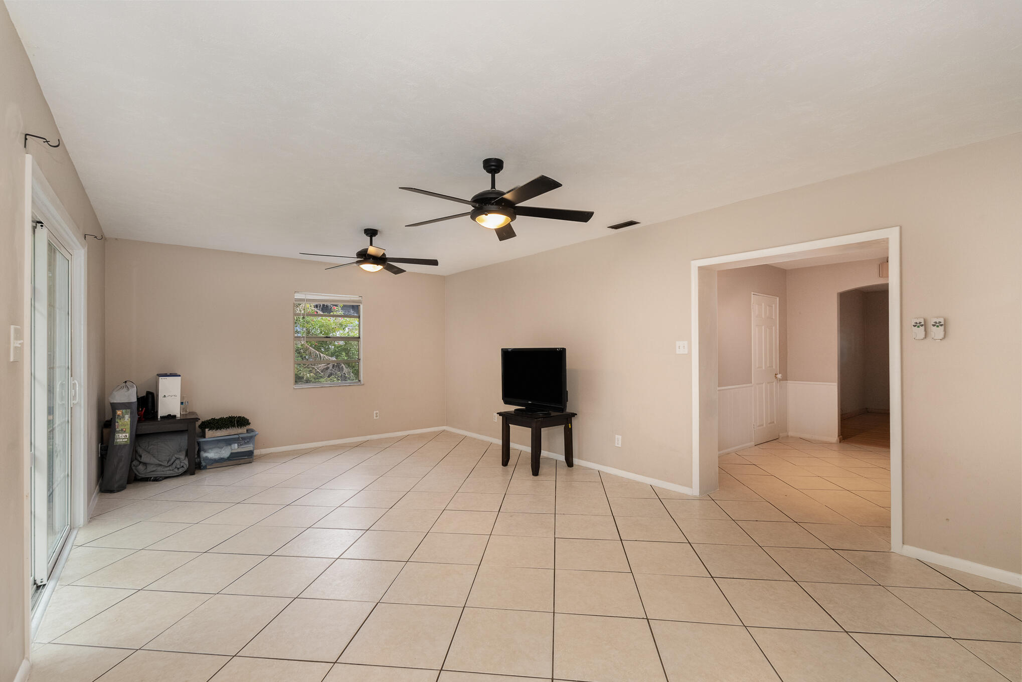 1908 Glendon Drive Melbourne, FL 32901 - Photo 14 of 26 a view of an empty room and a window