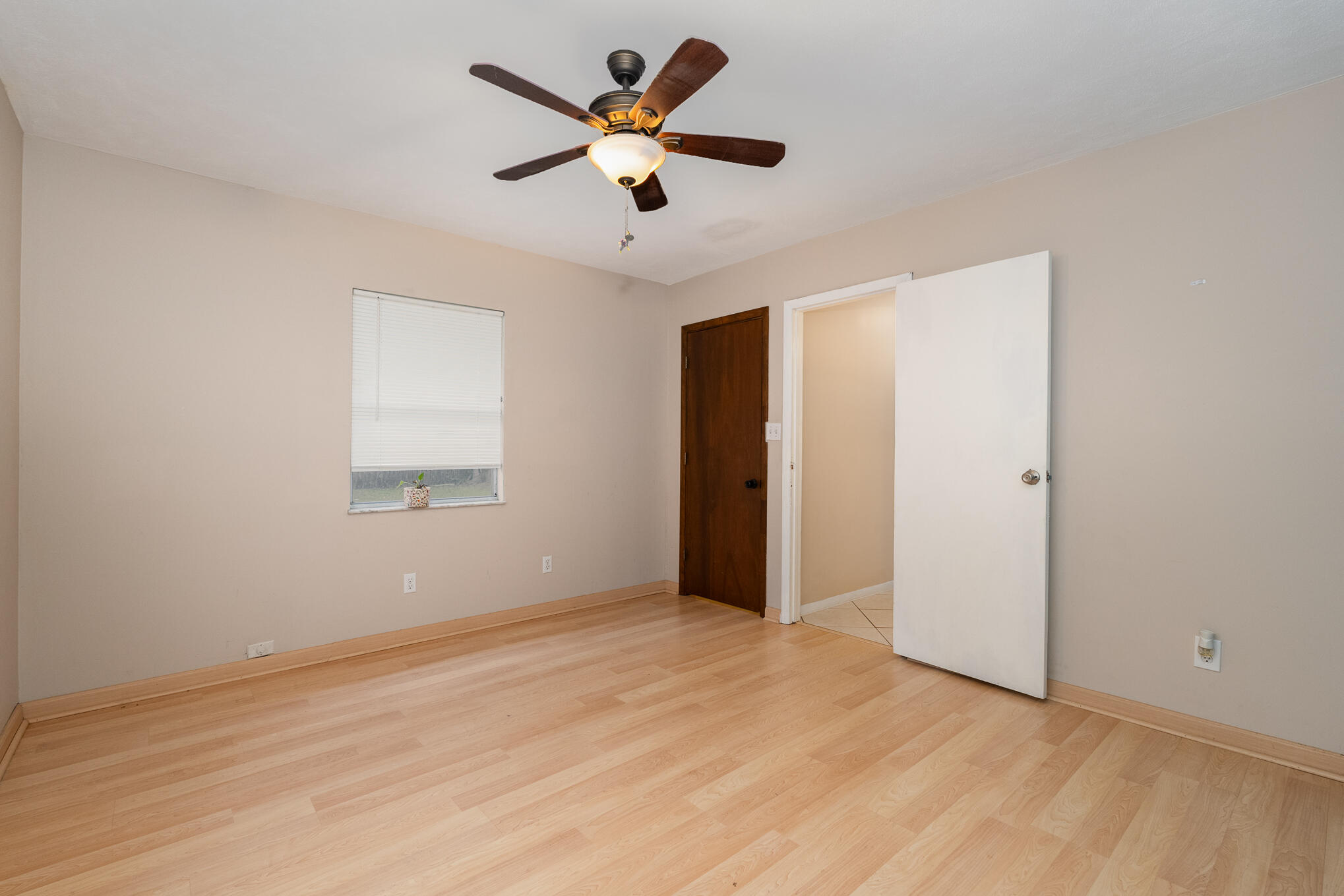1908 Glendon Drive Melbourne, FL 32901 - Photo 18 of 26 an empty room with fan and windows