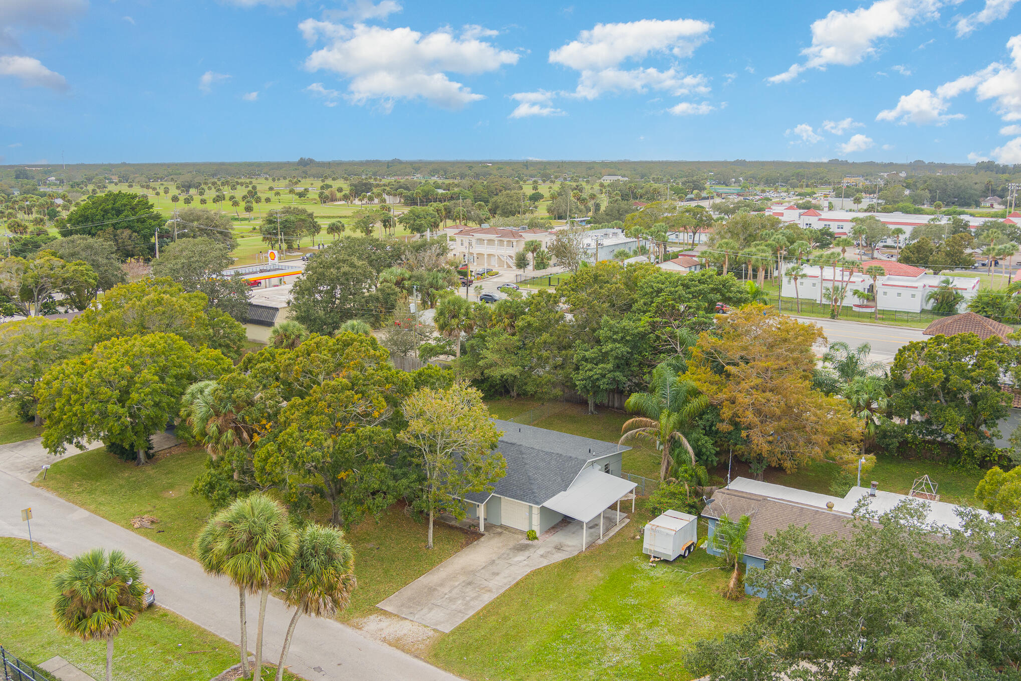 1908 Glendon Drive Melbourne, FL 32901 - Photo 2 of 26 a view of a lake with a yard