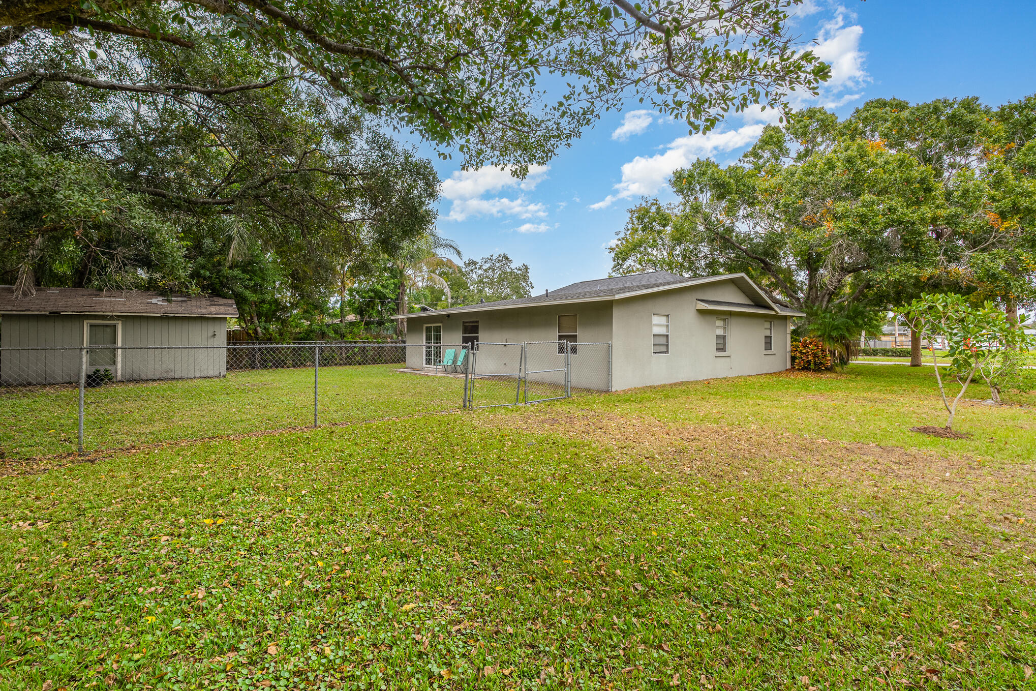 1908 Glendon Drive Melbourne, FL 32901 - Photo 23 of 26 a house view with swimming pool in front of it