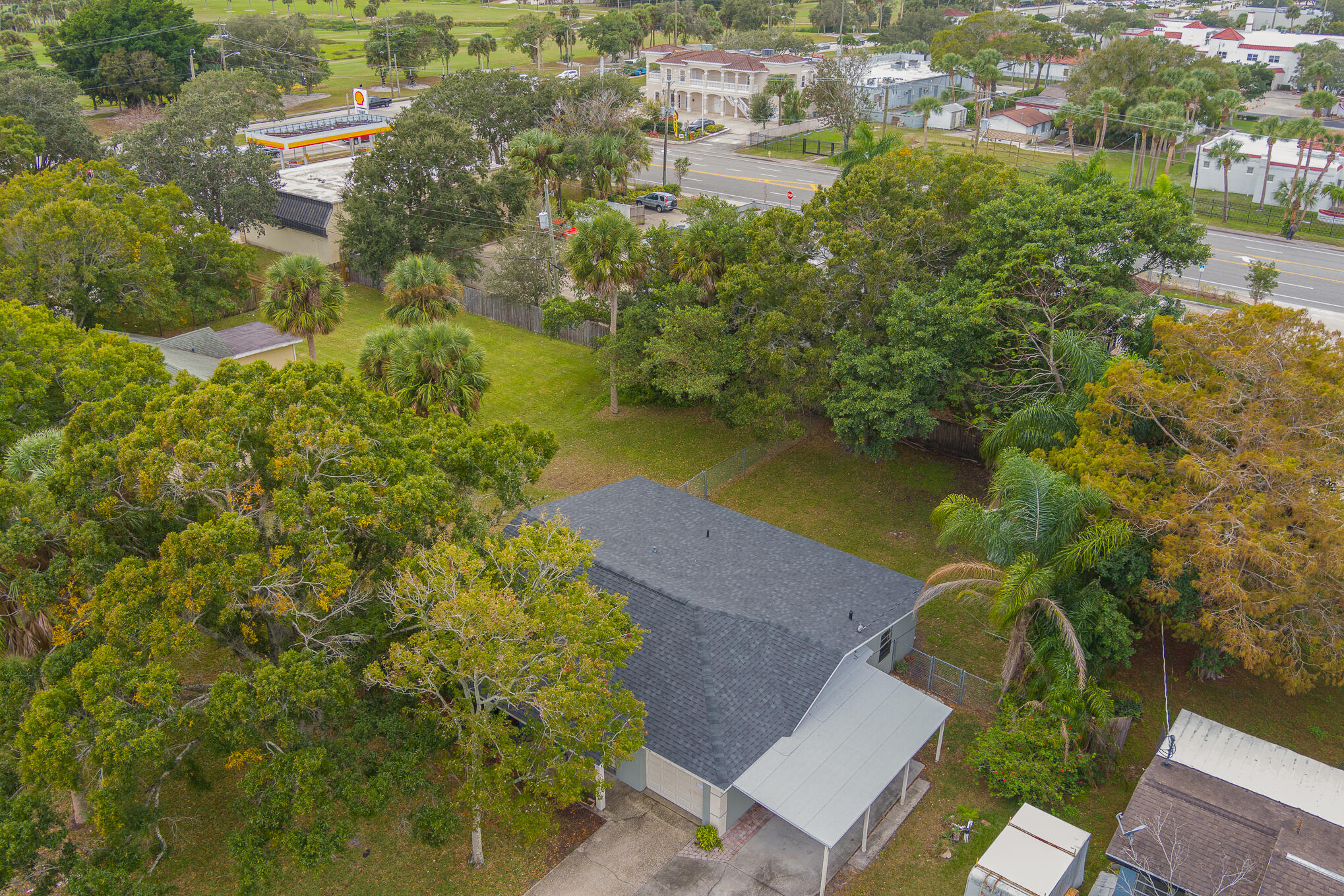 1908 Glendon Drive Melbourne, FL 32901 - Photo 10 of 26 an aerial view of residential houses with outdoor space and trees