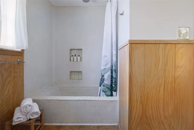 a room with furniture and a window