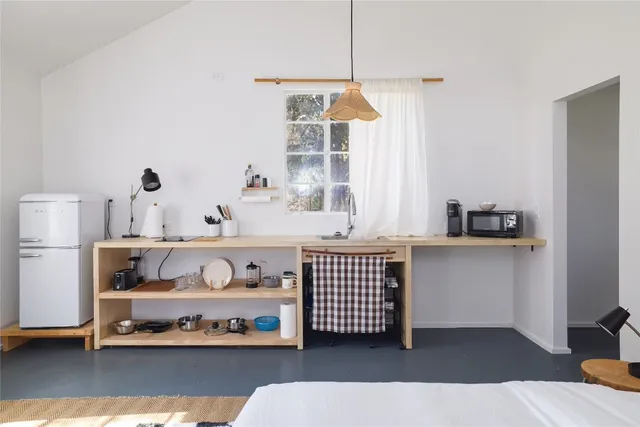 a view of a yard with large trees