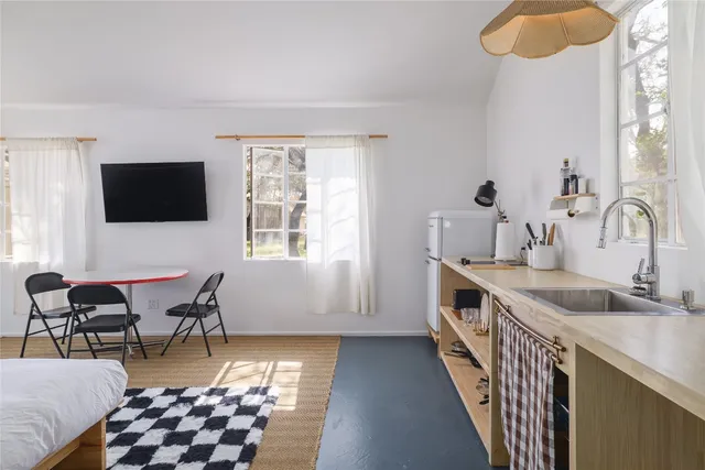 a view of swimming pool with a garden