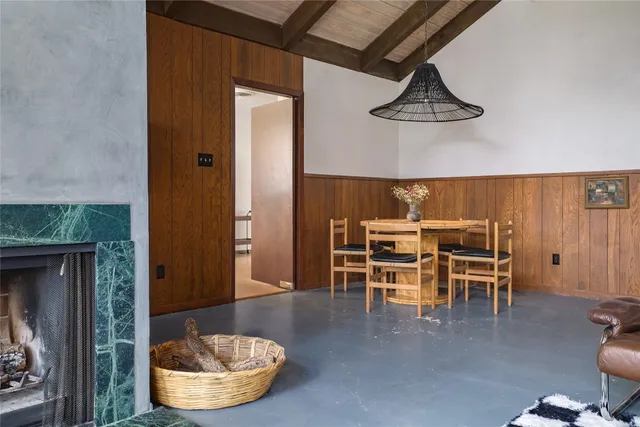 a kitchen with a stove a sink and a microwave