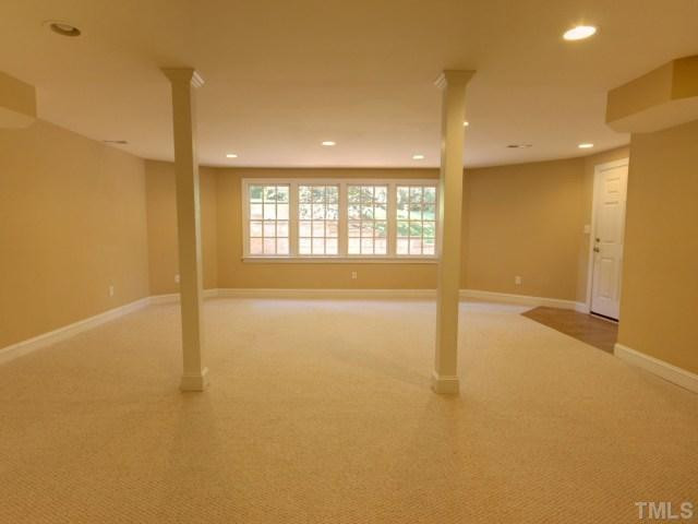 206 Avon Drive Raleigh, NC 27608 - Photo 11 of 12 On the Lower Level, a Huge Bonus Room has Home Theater Potential! Bonus Room