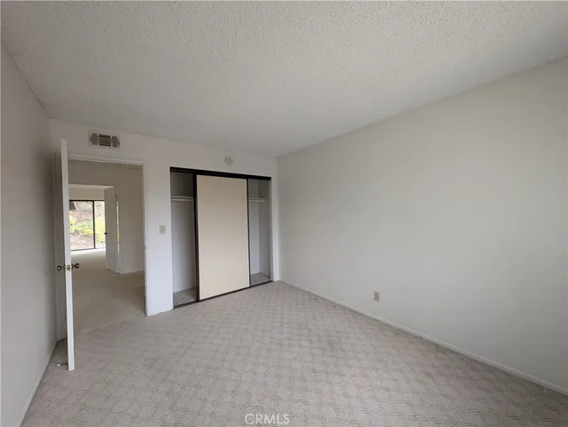 an empty room with closet