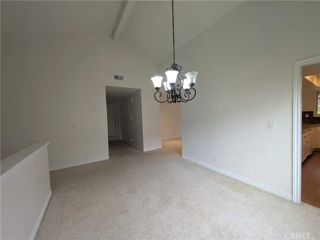 a view of a chandelier in a room