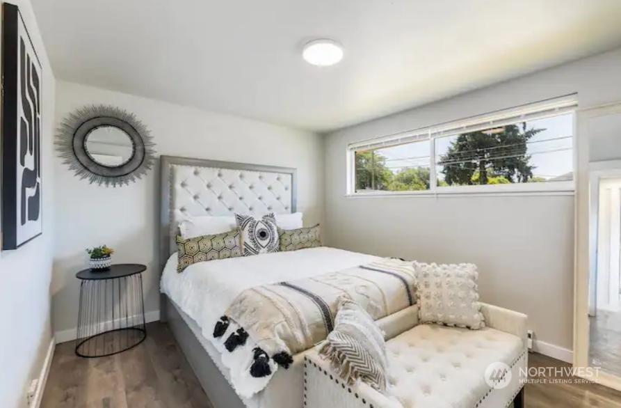 602 South 5th Street Renton, WA 98057 - Photo 13 of 27 a bedroom with a bed and window