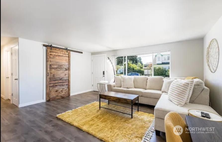 602 South 5th Street Renton, WA 98057 - Photo 14 of 27 a living room with furniture and wooden floor