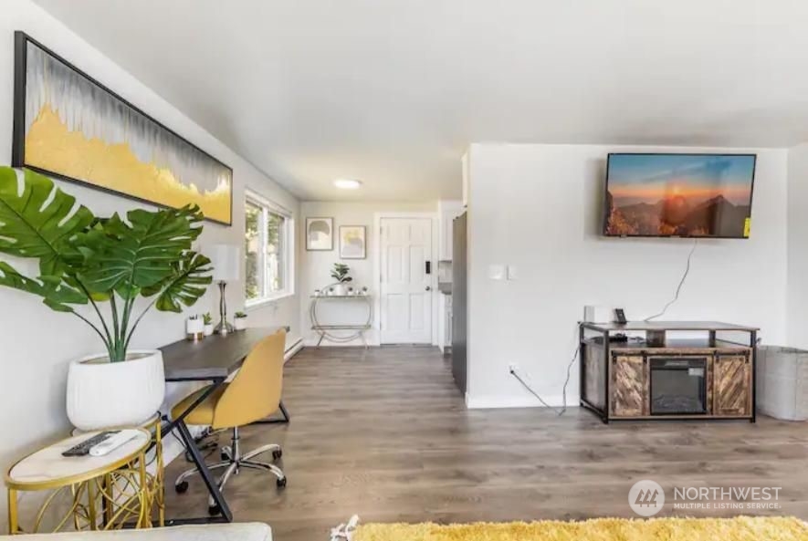 602 South 5th Street Renton, WA 98057 - Photo 20 of 27 a living room with furniture and a flat screen tv