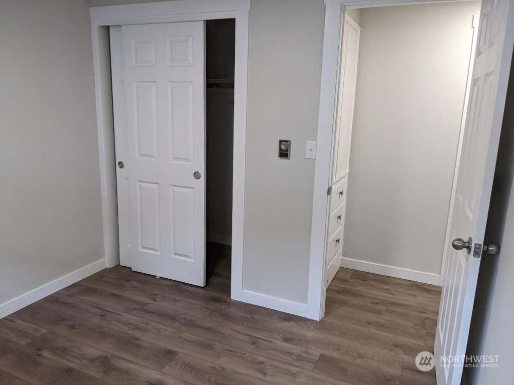 602 South 5th Street Renton, WA 98057 - Photo 26 of 27 an empty room with wooden floor