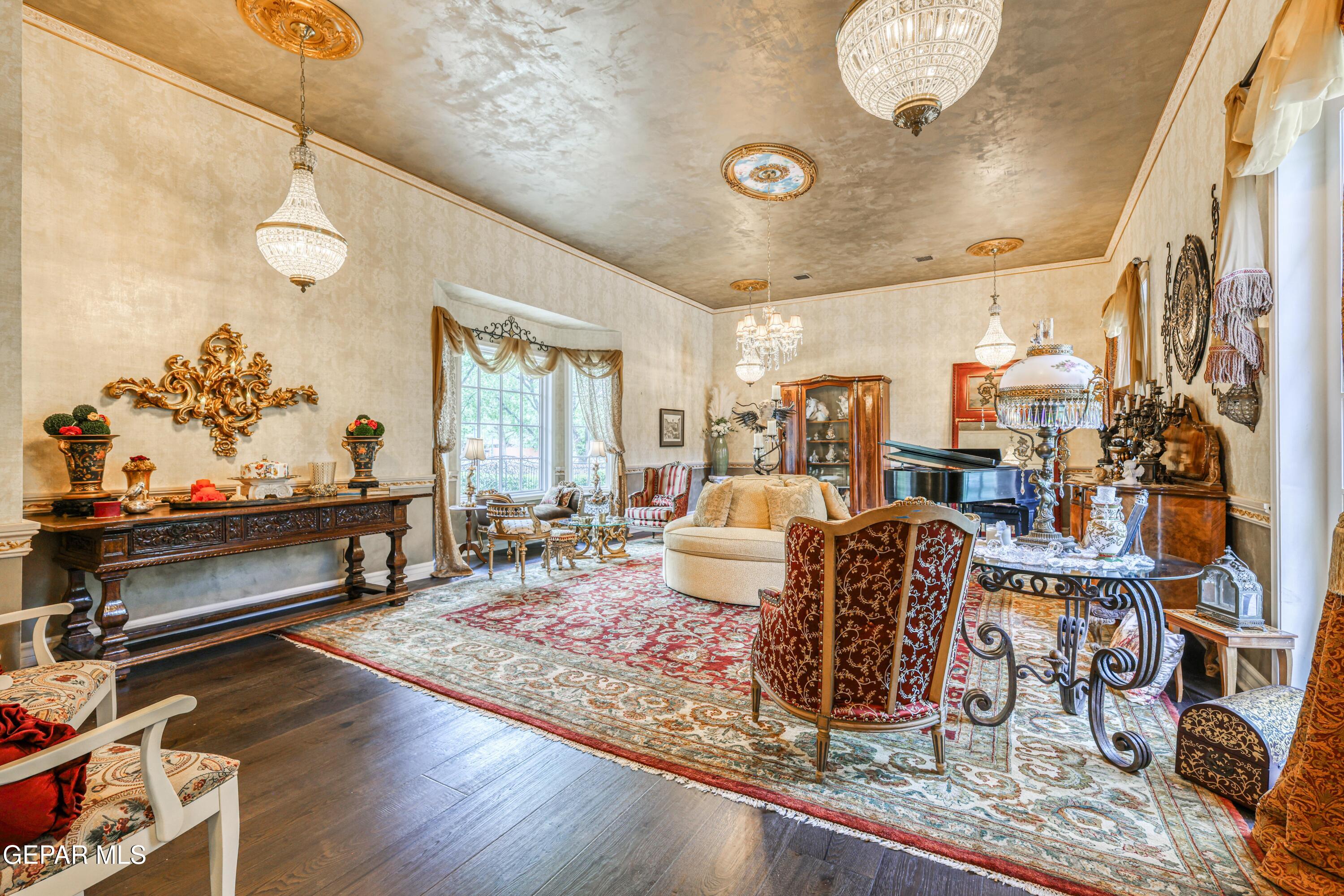 501 Country Club Road El Paso, TX 79932 - Photo 26 of 88 a living room with lots of furniture and a rug
