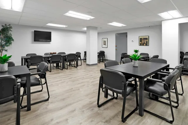 a view of a dining room with furniture