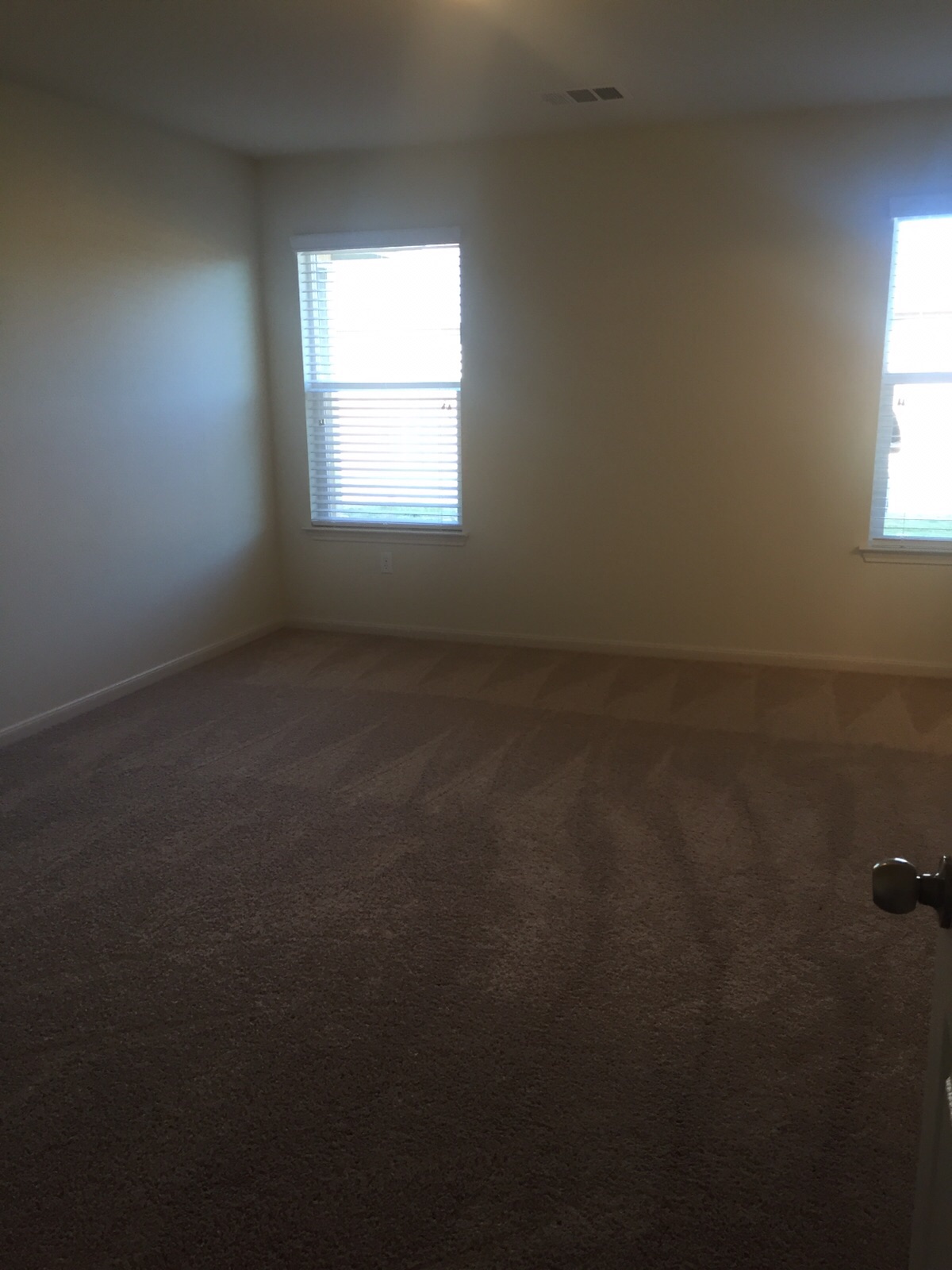 384 Discovery Kyle, TX 78640 - Photo 9 of 18 Unfurnished room with dark colored carpet and baseboards