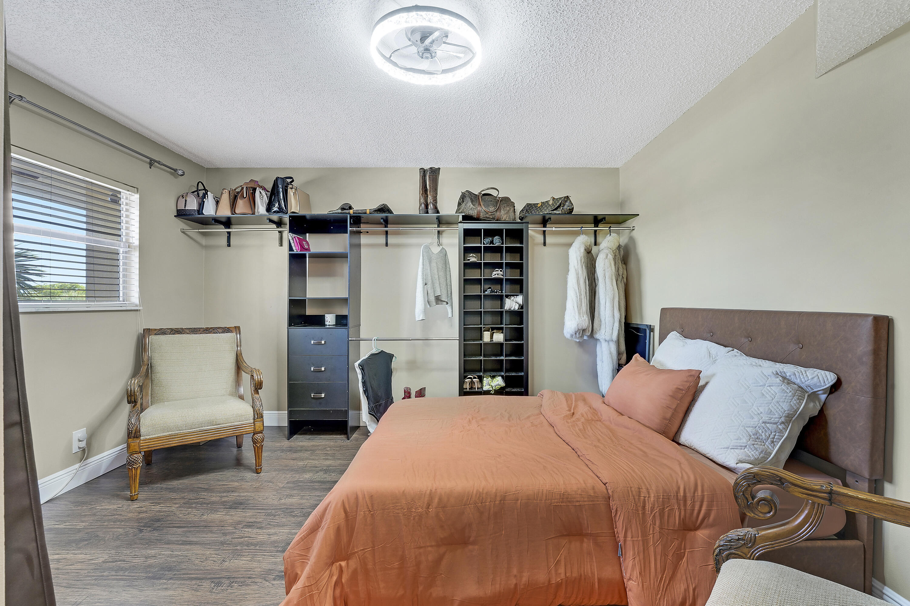 3755 Via Poinciana Lake Worth, FL 33467 - Photo 14 of 20 a bedroom with a large bed and a couch