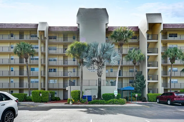a front view of a building with street view