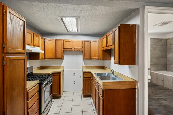 a living room with furniture and flat screen tv