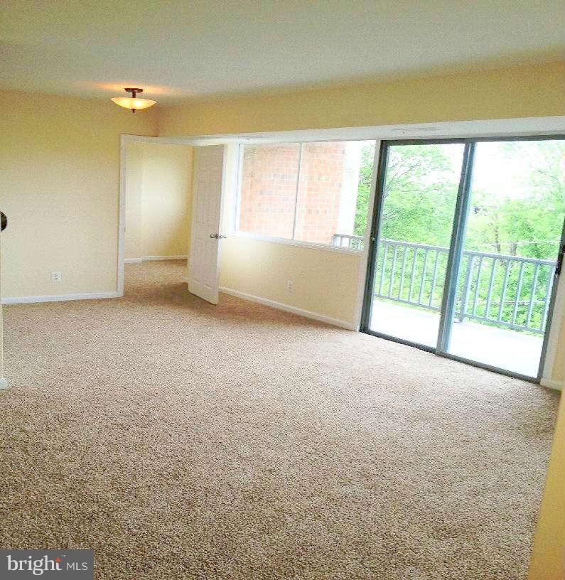 5801 Quantrell Avenue, Unit 306 Alexandria, VA 22312 - Photo 7 of 13 Living Room
