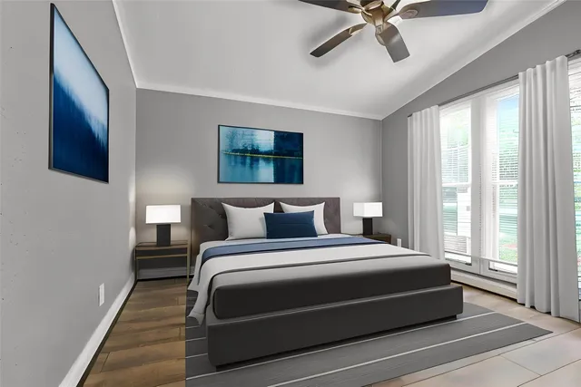 a bedroom with bed and window