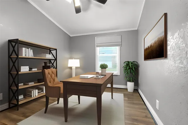a view of a livingroom with furniture and a flat screen tv