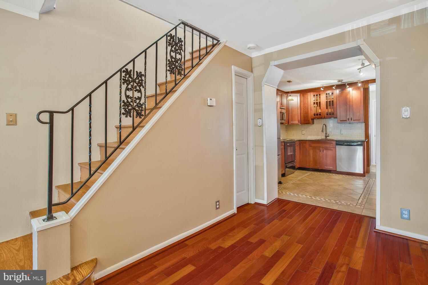 1148 Roland Heights Avenue Baltimore, MD 21211 - Photo 17 of 38 Wood stairs to upper level