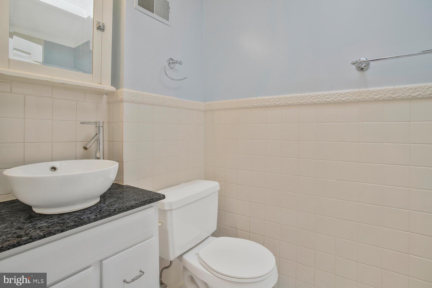 1148 Roland Heights Avenue Baltimore, MD 21211 - Photo 21 of 38 Updated vanity and fixtures